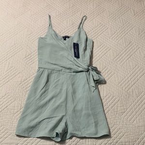 Brand: One Clothing; Style: romper WITH POCKETS; Size Small; never been worn!
